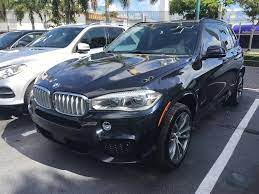 Comparison between CTS Sedan and BMW x5 2014