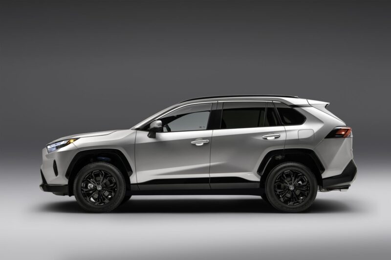 Side view of silver 2022 Toyota RAV4 SE Hybrid